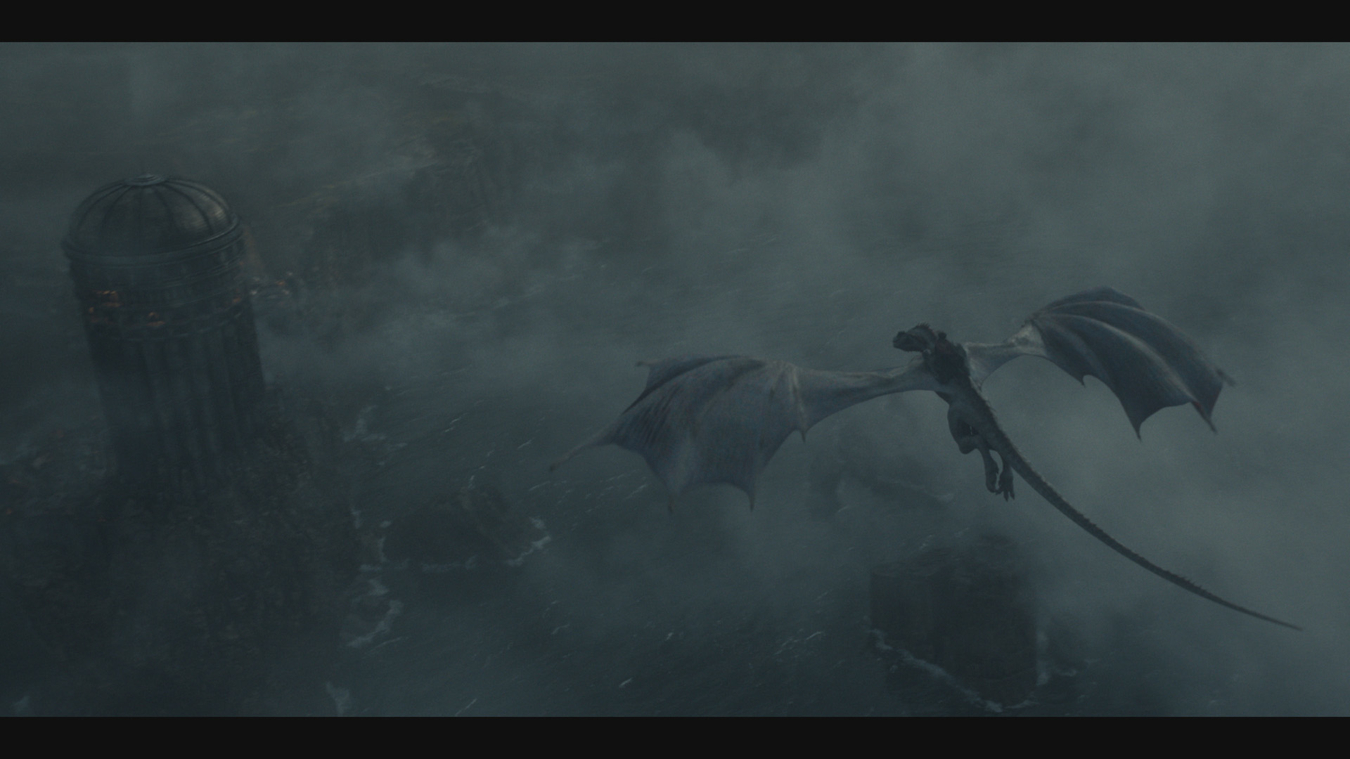 A dragon flies over the clouds setting an ominous tone in house of the dragons episode 10